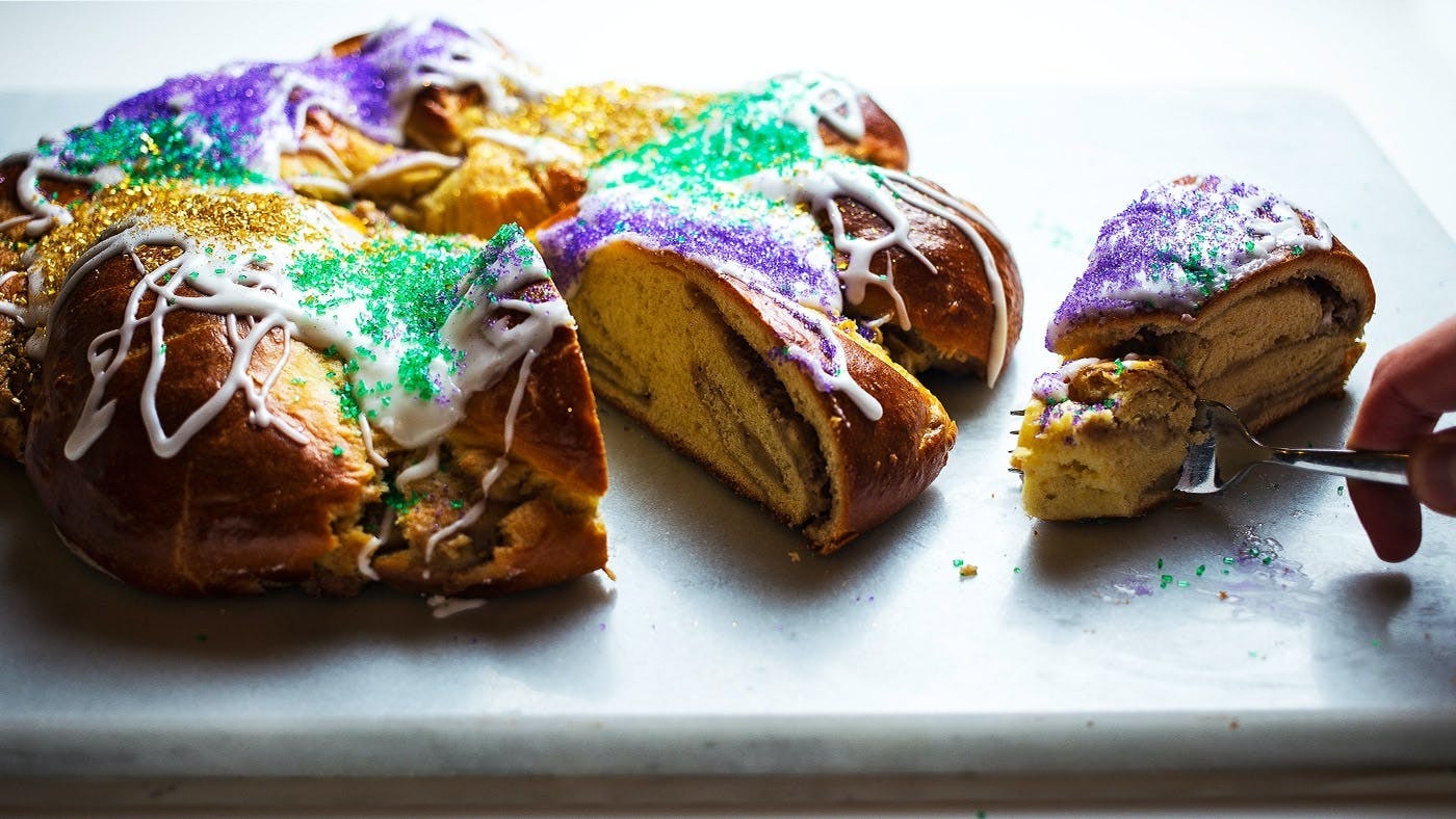 Traditional Mardi Gras king cake on a table