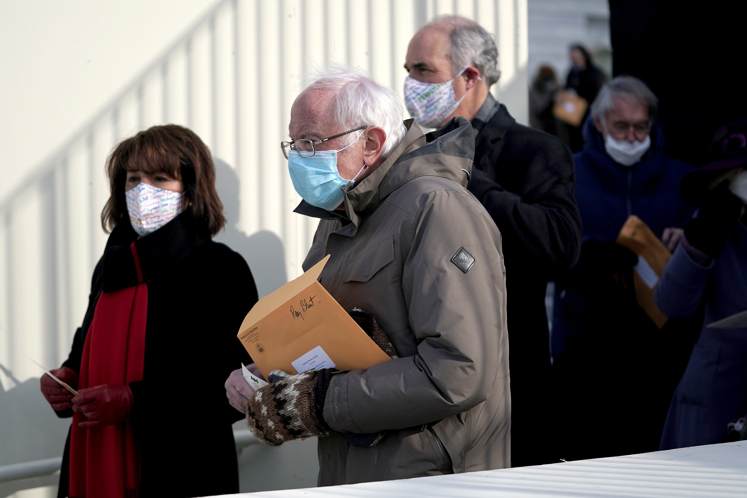 Sen. Bernie Sanders is seen prior to the Presidential Inauguration carrying a manilla folder