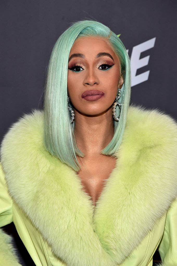 Cardi B's Sheer Thigh-High Stockings & Pumps Accent Her Cutout Dress –  Footwear News