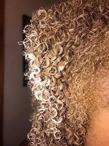 reviewer photo showing the tight curls in their hair
