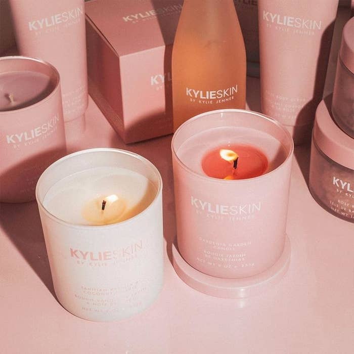 Two candles in vanilla and blush containers 