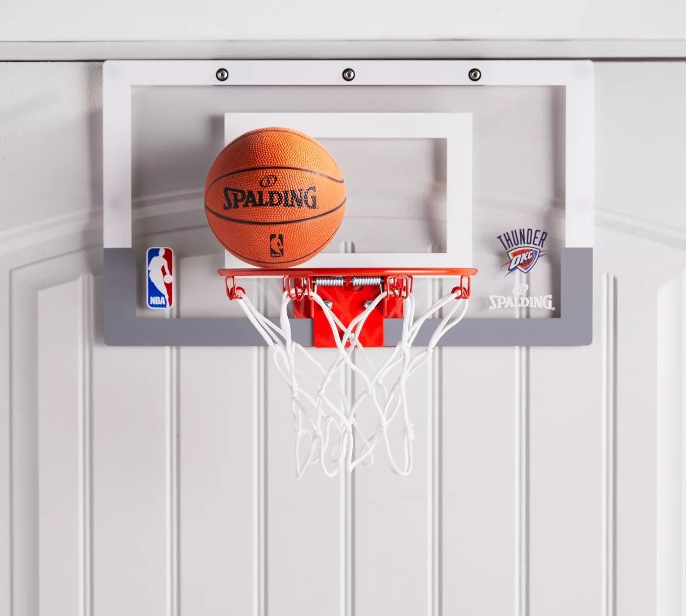 The Spalding basketball hoop and mini rubber ball