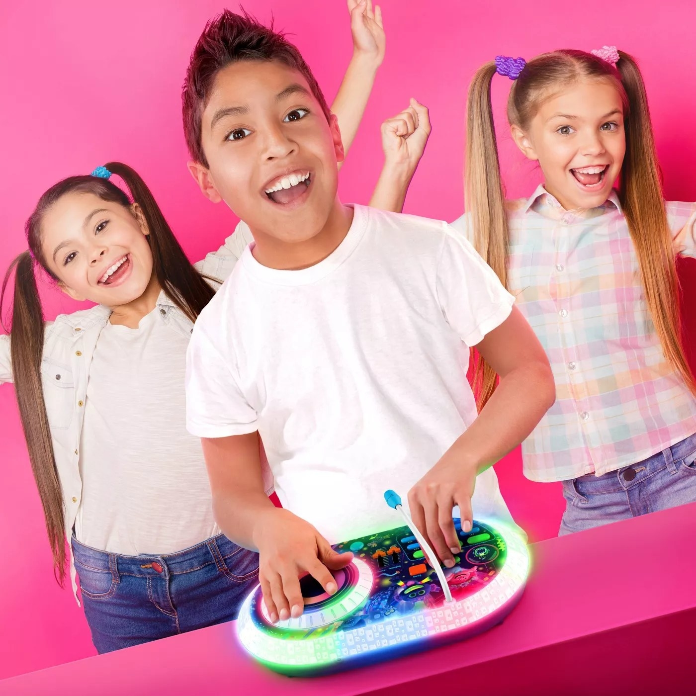 A child playing with the light-up party mixer