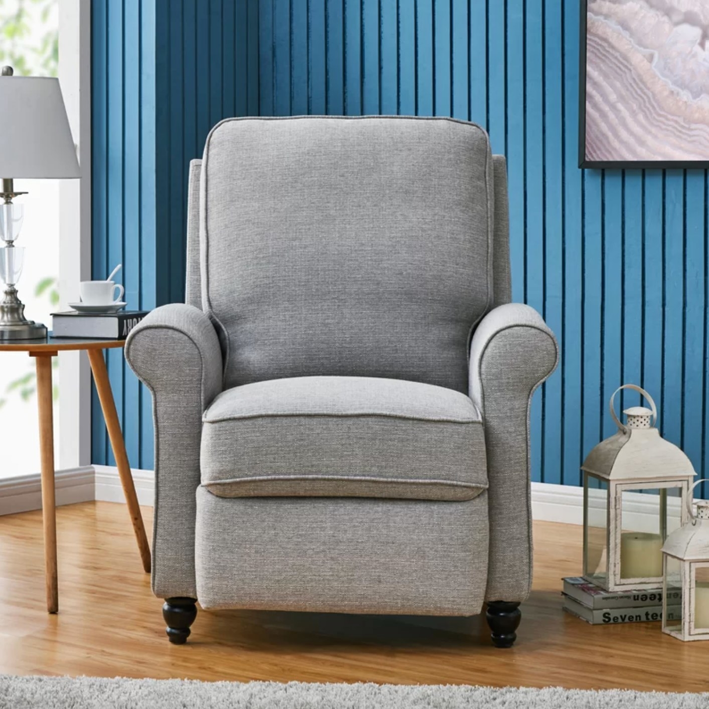 The manual recliner in dove gray polyester