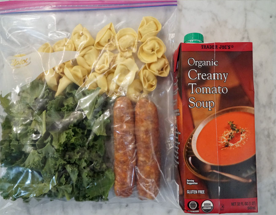 Ingredients for tortellini sausage soup ready to be frozen.