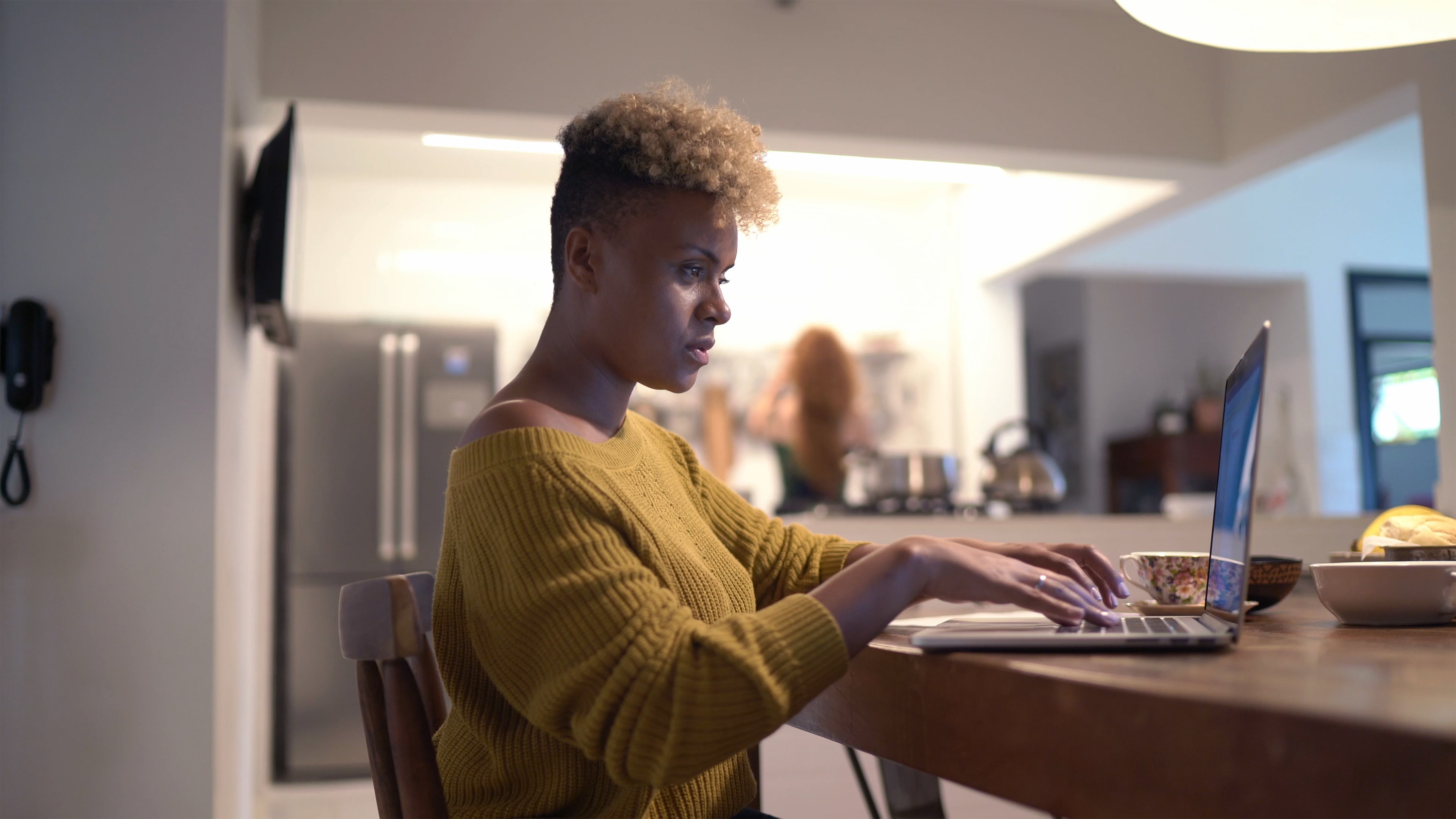 Young woman using a laptop at home