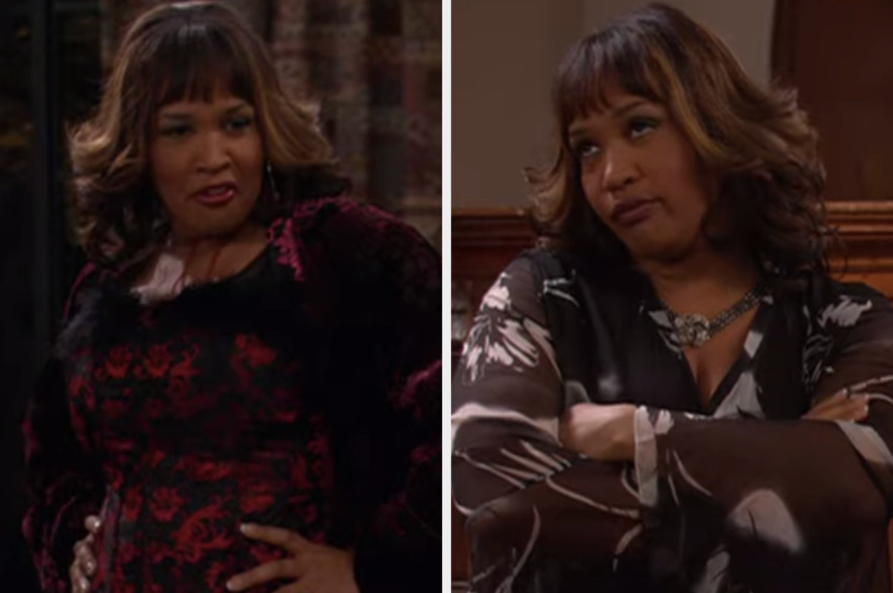 Kym Whitley is posing in her lingerie with her hands on her hip and on the right with her arms crossed