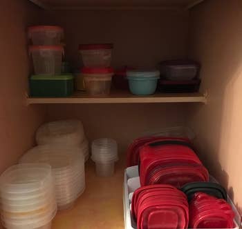 A reviewer's photo of the lid organizer in their cabinet