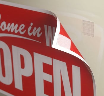 another sign with a velcro square in the corner