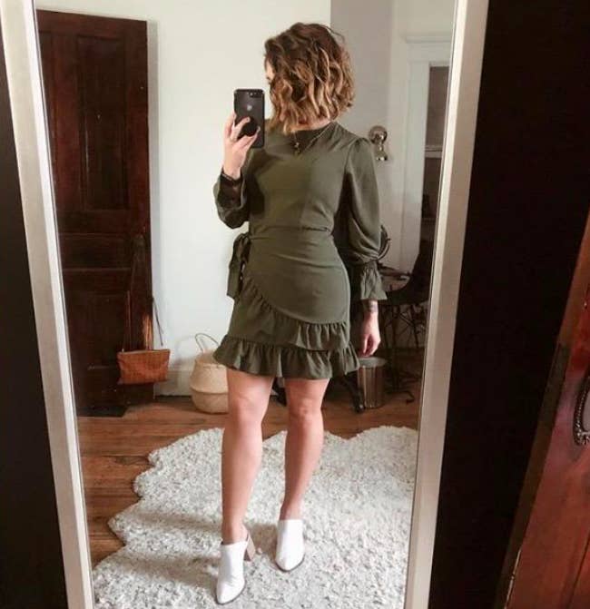 A customer review photo of them wearing the dress in army green