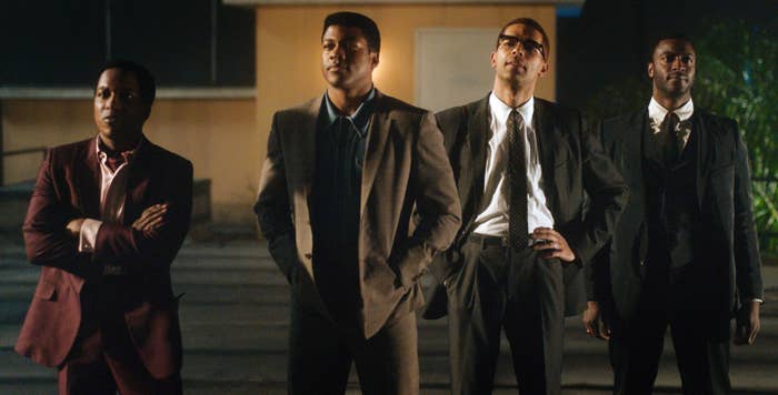 Sam Cooke, Muhammad Ali, Malcolm X, and Jim Brown standing on the roof of their hotel