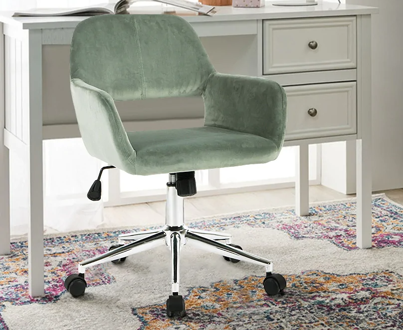 A swivel office chair in front of a desk. The chair is on a rug with different patterns. 