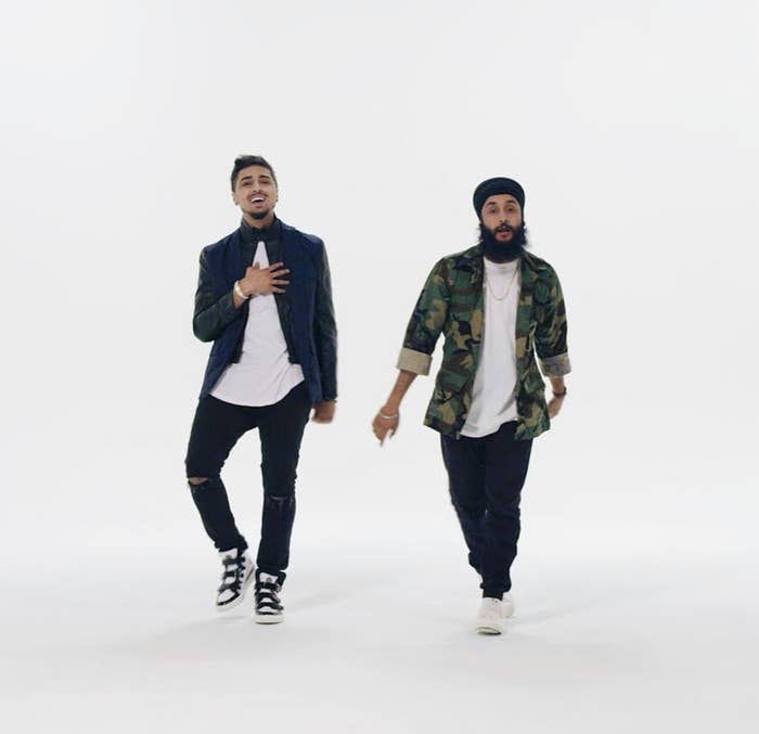Fateh (right) singing with Amar Sandhu (left) in the 15 Minutes music video.