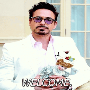Robert Downey Jr saying &quot;welcome&quot; and holding a doll