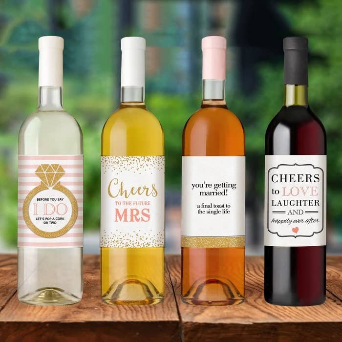 Wine bottles with personalized labels for the bride and groom.