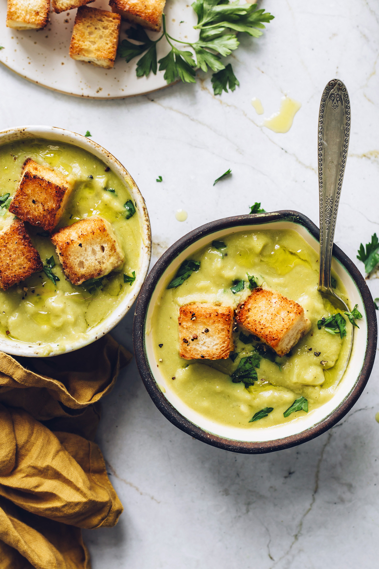 Bowls of potato green split pea soup