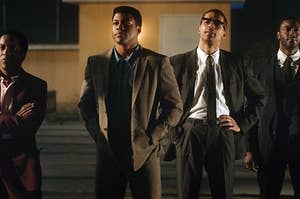 Sam Cooke, Muhammad Ali, Malcolm X, and Jim Brown standing on the roof of their hotel