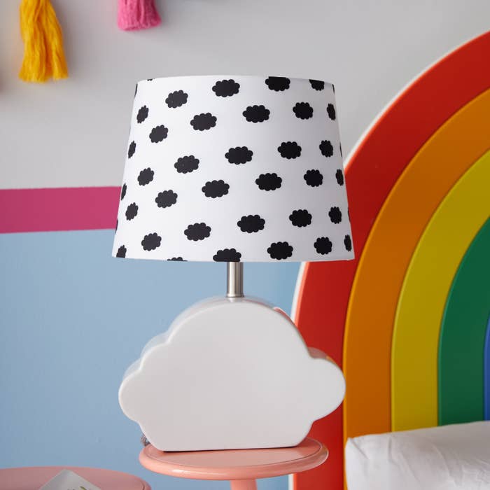 The cloud lamp in front of a rainbow