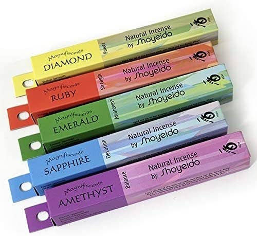 Five different-colored boxes of Shoyeido Natural Incense
