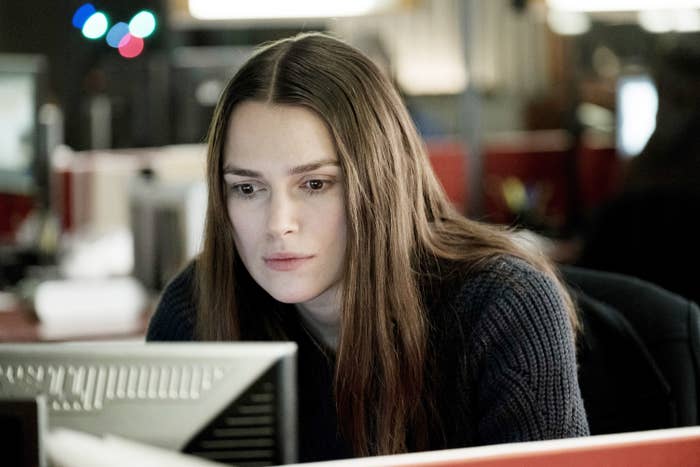Keira Knightley looks at a computer in the 2019 film Official Secrets