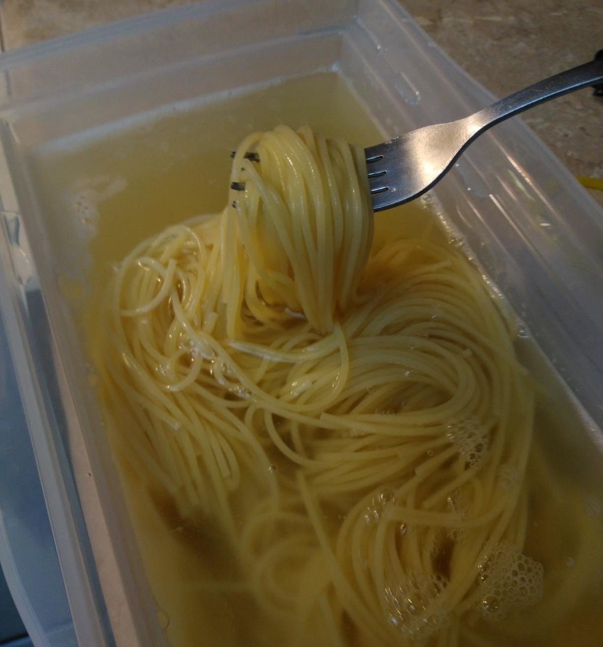 reviewer photo showing perfectly cooked pasta in the pasta maker