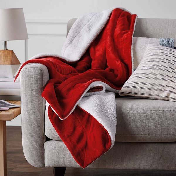 Sherpa throw placed on couch