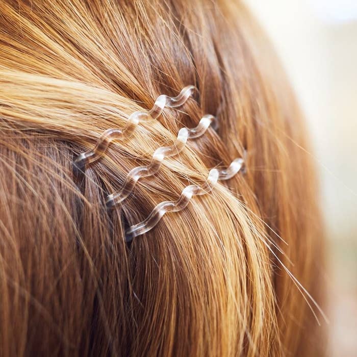 A close up of a trio of the hair clips on someone&#x27;s hair