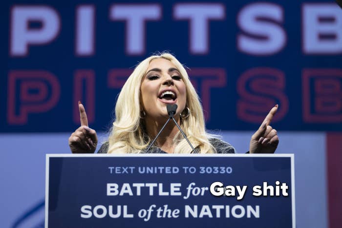 Lady Gaga speaking at a Biden campaign event with a sign on her podium manipulated to say "Battle for Gay shit Soul of the Nation" rather than "Battle for the soul of the nation"
