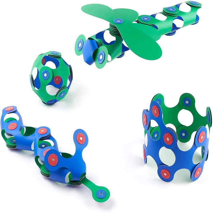the flexible and magnetic toys bent into the shape of an air plane and other objects