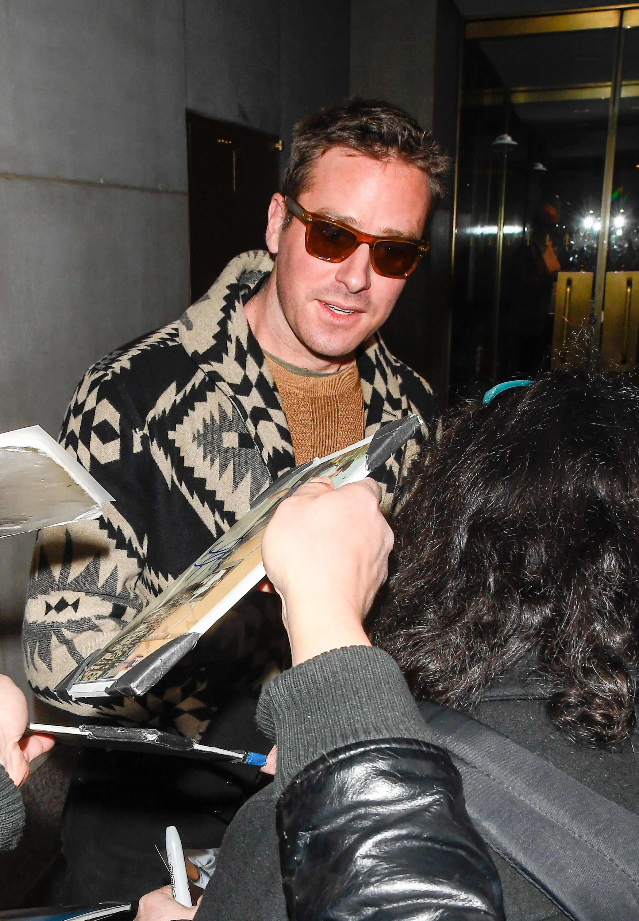 Armie Hammer is seen outside the Today Show speaking to people seeking autographs