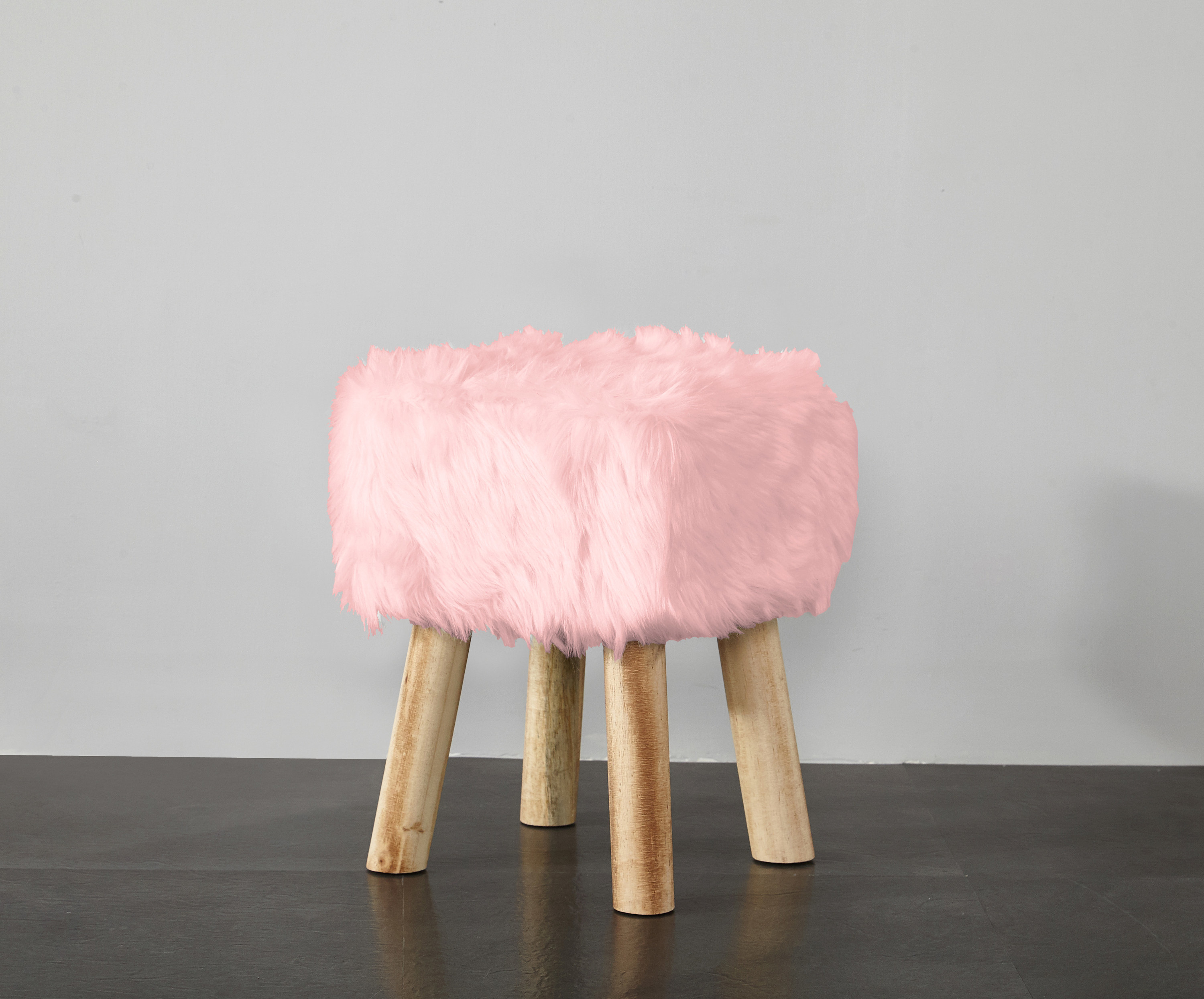 The pink faux fur stool
