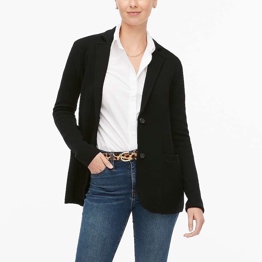 A model in the two-button sweater blazer in black