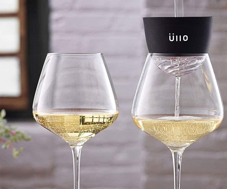 a wine glass with the purifier in the top of the glass