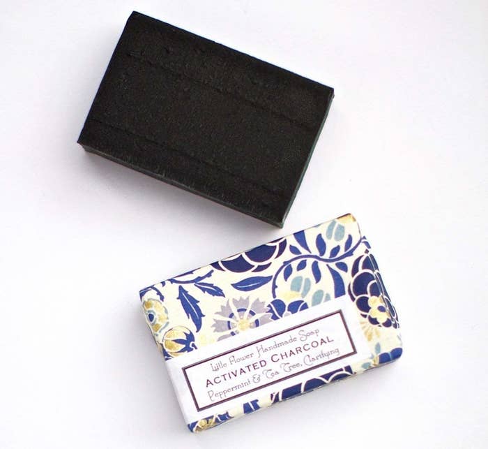 the black charcoal soap bar and the pretty packaging the soap comes in 