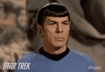 Spock from Star Trek showing the victory symbol with his hand 