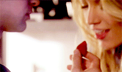 Nate feeds Serena a strawberry and they kiss