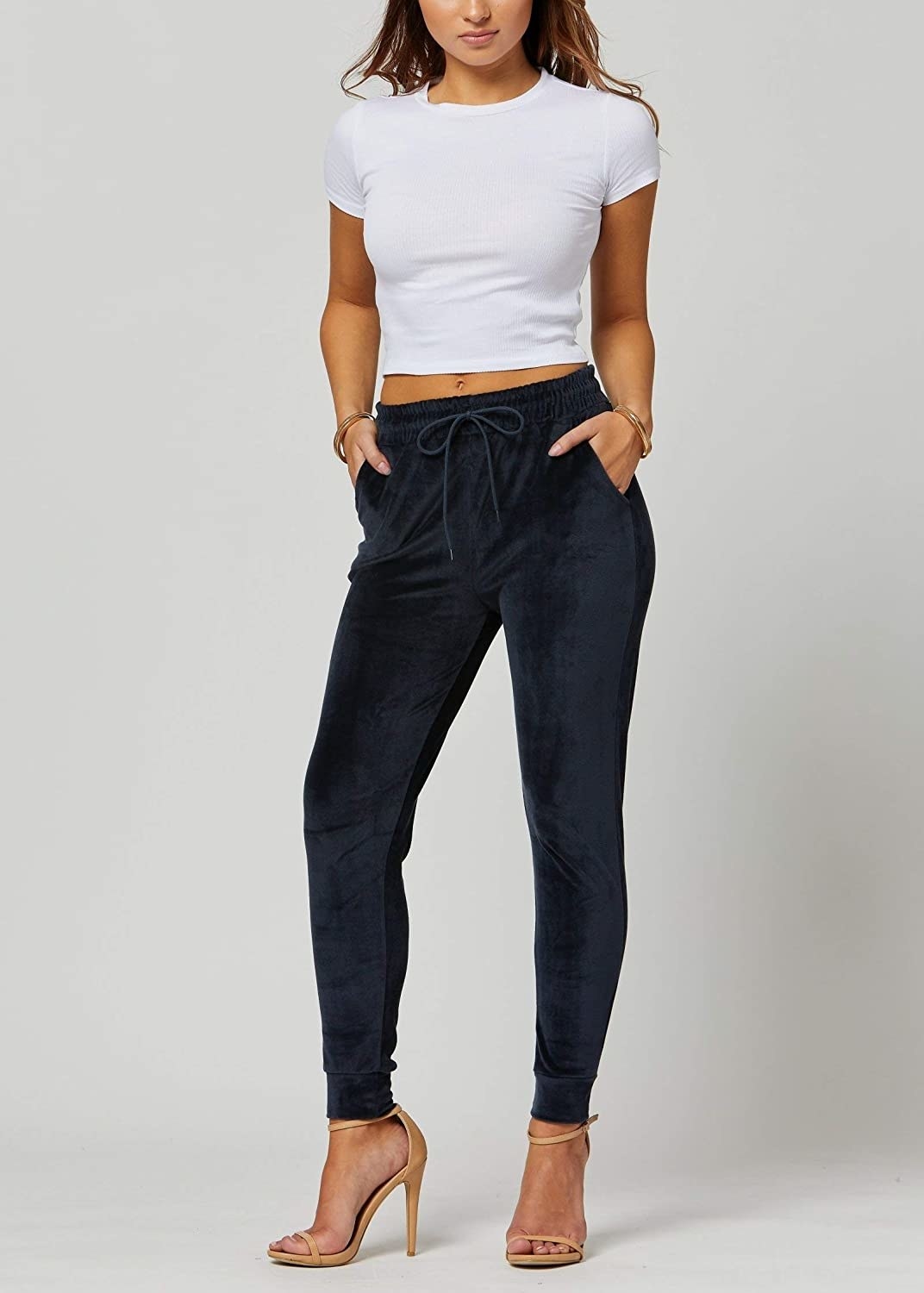 Model in the navy blue slim cut joggers