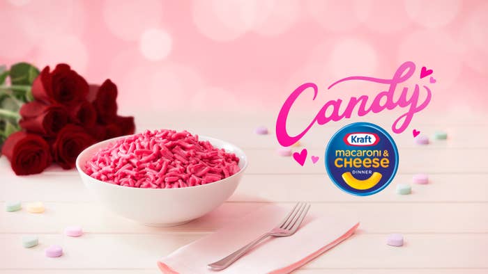 A Valentine&#x27;s Day-themed promotional for the pink Kraft mac and cheese that features roses, candy hears, and the word &quot;Candy&quot; in fancy lettering