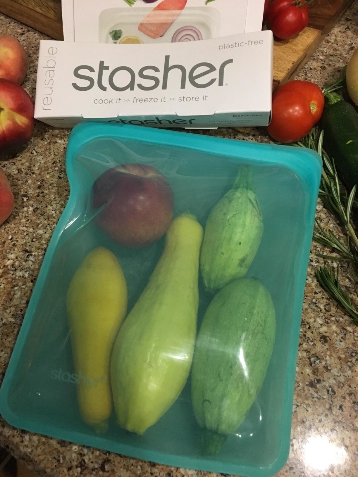 Reviewer produce in reusable silicone bag