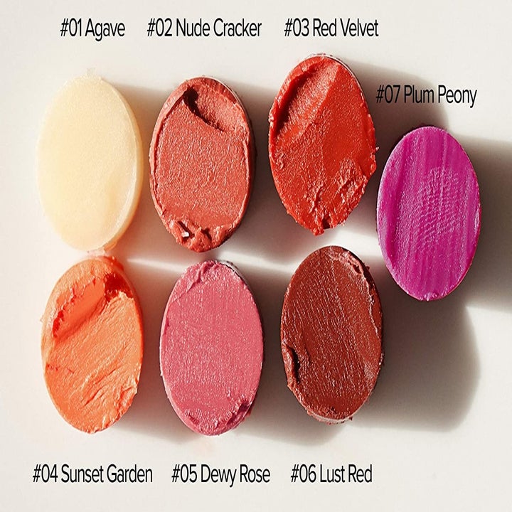 the lip balm in seven different tints 