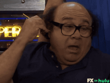 A gif of Frank from the show It&#x27;s Always Sunny In Philadelphia scratching the inside of his ear with a pencil.