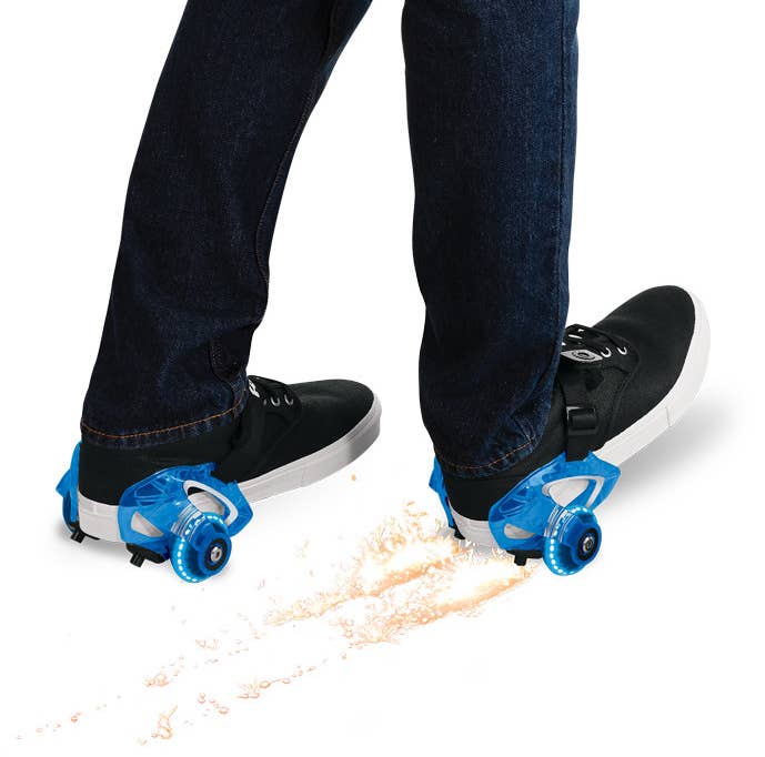 blue razor heel wheels on a person's shoes