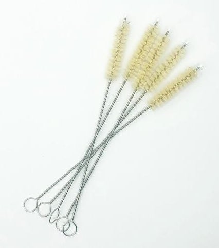 A set of five slim straw cleaning brushes 