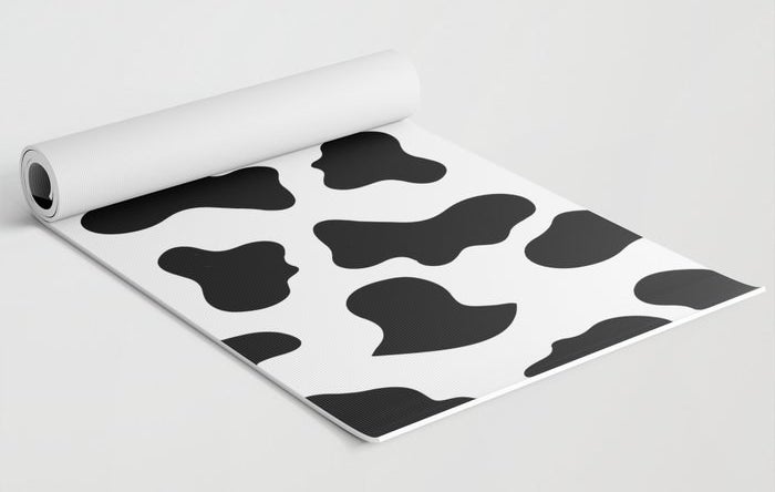 The black and white cow-print mat