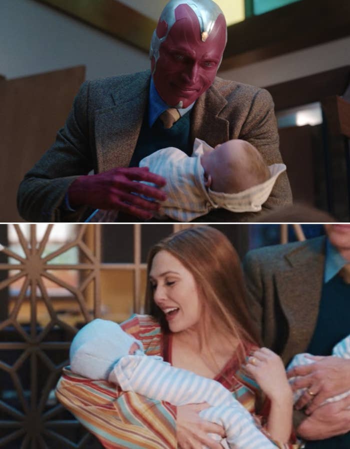 Vision and Wanda holding their twins, Billy and Tommy