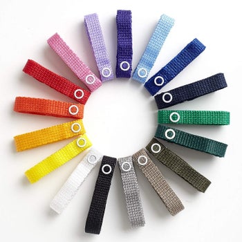 Several colorful snap-on straps displayed in a circle 