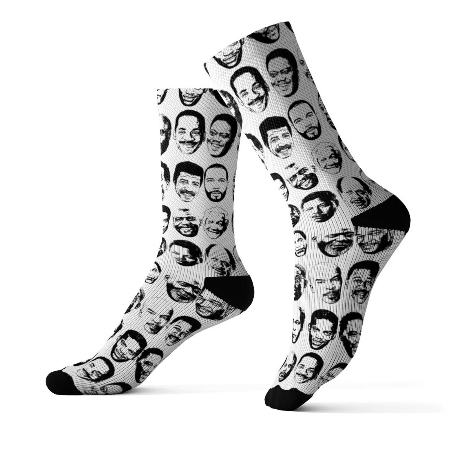 black and white crew socks with Black TV dads&#x27; faces printed all over them