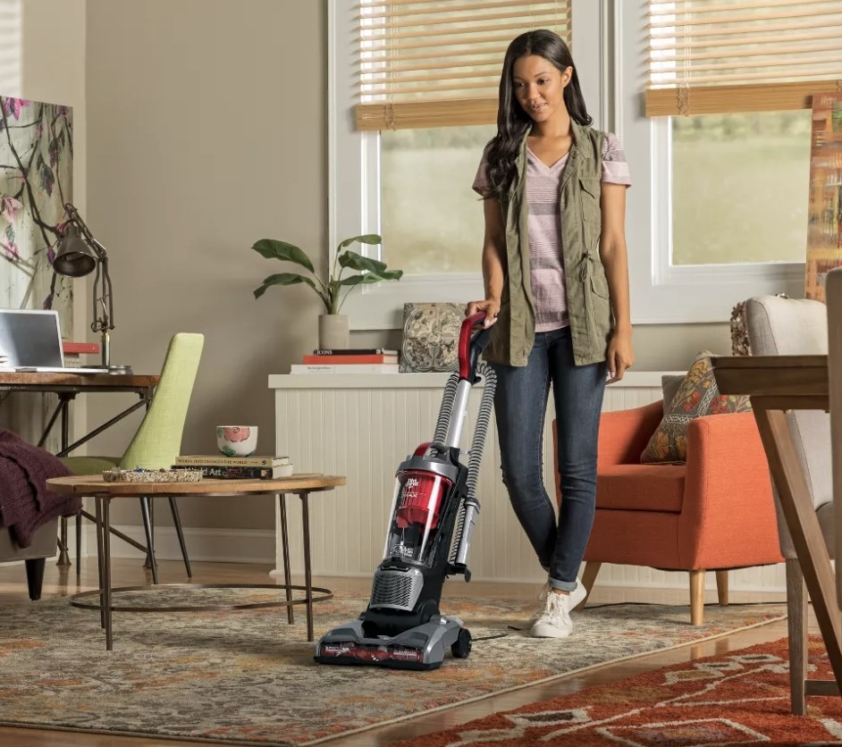 Person is using a vacuum