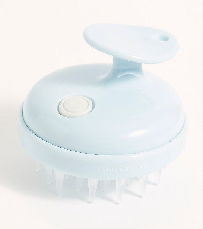 Light blue scalp massager with a button to control vibrations