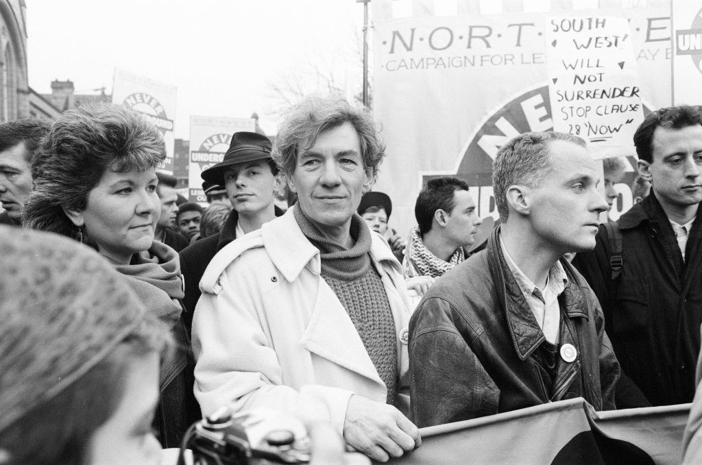 Young Sir Ian McKellen at a gay pride rally.